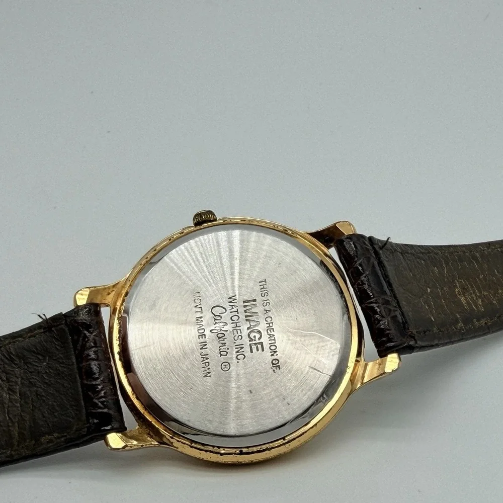 Alfred Hitchcock‎ Logo Image Watches Inc California Japan Movt Gold Tone Watch
